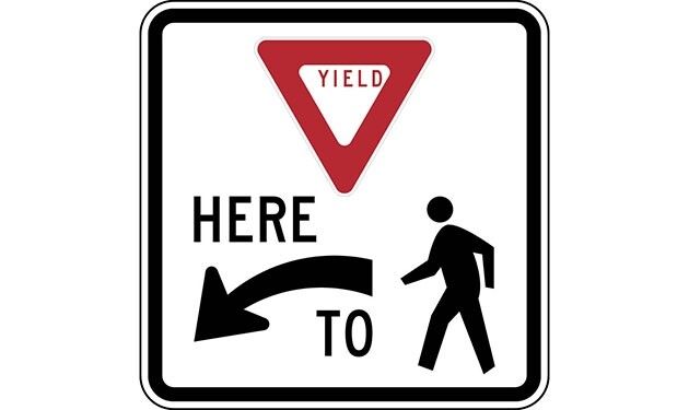 Yield Here To Pedestrians Left Arrow with Ped Symbol Sign